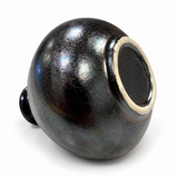 Underside of Kouzan ceramic bud vase showing its unglazed foot ring