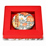 2021 Premium White Peony White Tea Cake 100g displayed in red presentation box