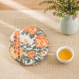 2021 Premium White Peony White Tea Cake with teapot and brewed white tea