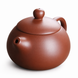 Yixing Zisha clay teapot with smooth round body and traditional reddish-brown finish