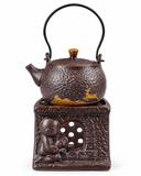 Compact 190ml gongfu teapot with matching candle warmer and brown hammered texture