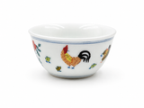 White ceramic tea cup with hand-painted rooster and chicks