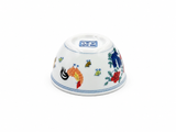 Upside-down white ceramic tea cup with rooster and floral artwork