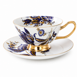 Blue and gold floral bone china cup with matching saucer and gold handle