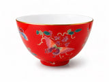 Blue porcelain gongfu tea cup with butterfly floral pattern and gold-tone rim