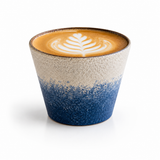 Hand-painted ocean latte cup with blue-to-cream glaze and latte art
