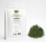 LuAn GuaPian loose leaf green tea in a white pouch with loose tea leaves