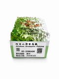 Alishan Aromatic Oolong Tea package with green embossed wrapper and product label