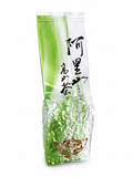 Tall green and white Alishan Aromatic Oolong Tea pouch with Chinese characters