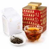Liu Xia ancient tree black tea tin with loose tea, brewed tea, and wrapped tea bag