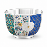 Silver-plated tea cup with colorful floral and geometric enamel patterns on a clean white background.