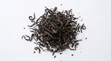 Loose dark, twisted leaves of Sun Moon Lake Emerald Black Tea from Taiwan