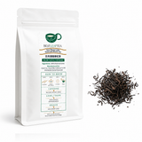 Sun Moon Lake Emerald Black Tea 150g pouch beside loose dark tea leaves