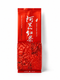 Red pouch of Taiwan Alishan black tea with loose leaves