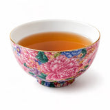Floral gongfu tea cup with pink, blue, and green flower pattern