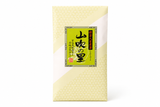Front view and back view of Yamabuki no Sato Matcha Genmaicha Japanese green tea package, 85g.