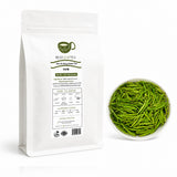BESTLEAFTEA Zhu Ye Qing Green Tea 200g pouch with fresh green tea leaves on a clean white background