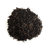 Taiwan lychee smoked black tea loose leaf on white background, premium natural black tea with minimal stems, no artificial flavor